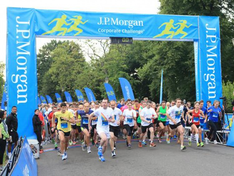 Event branding for the run included gantry covers, barrier wraps and feather flags