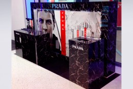 Chic, bespoke promotional site produced for Prada, featuring product plinths, counter display units and large lightbox graphics