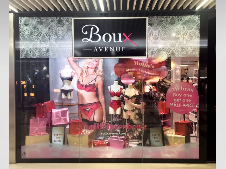 Window graphics and display materials for Boux Avenue's Guilford store