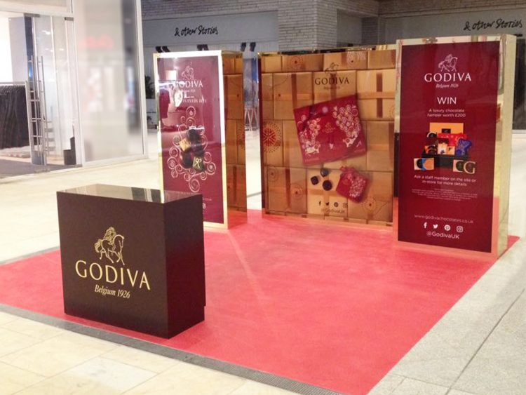 Christmas Pop-Up Site for Godiva Chocolates, featuring luxurious freestanding display units.